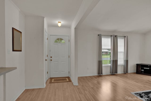 101 W Jefferson Ave, Haughton, LA 71037 - entrance foyer featuring light wood-type flooring, crown molding, and baseboards