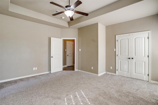 140 Champion Ct, Weatherford, TX 76087 - unfurnished bedroom featuring carpet flooring, baseboards, a closet, and ceiling fan