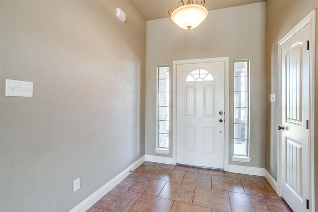 entryway featuring light tile patterned floors