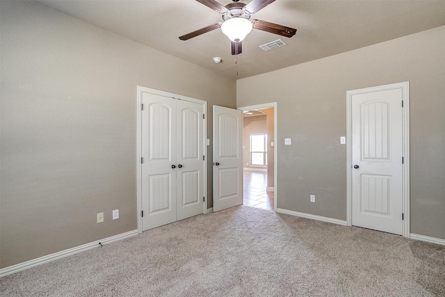 140 Champion Ct, Weatherford, TX 76087 - unfurnished bedroom featuring carpet floors, baseboards, and ceiling fan