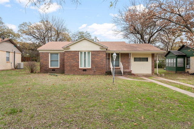 view of front of home featuring cooling unit and a front lawn