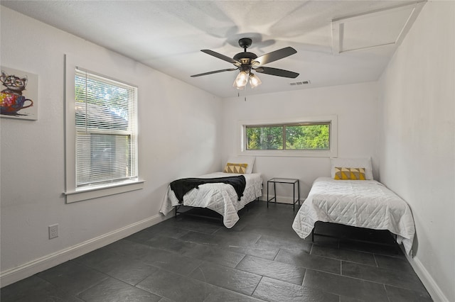 bedroom featuring ceiling fan