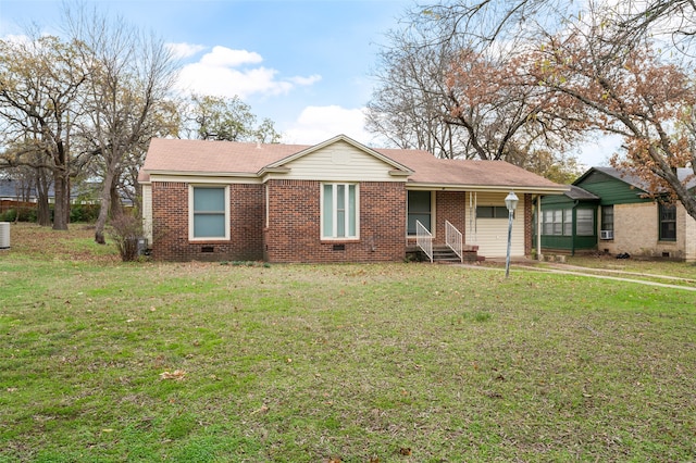 view of front facade with a front lawn