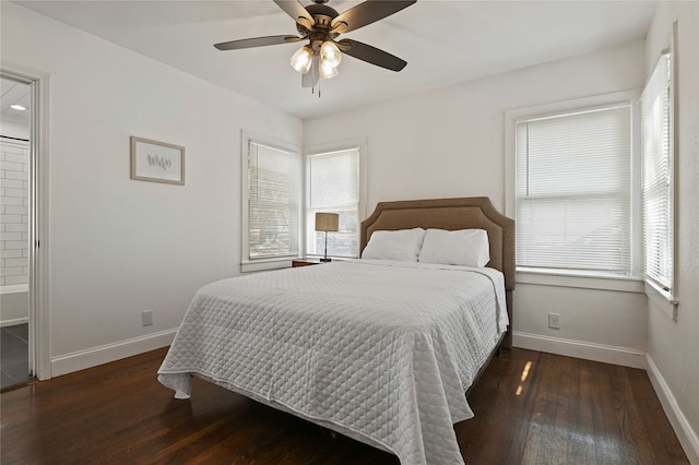 bedroom with ceiling fan and dark wood-type flooring