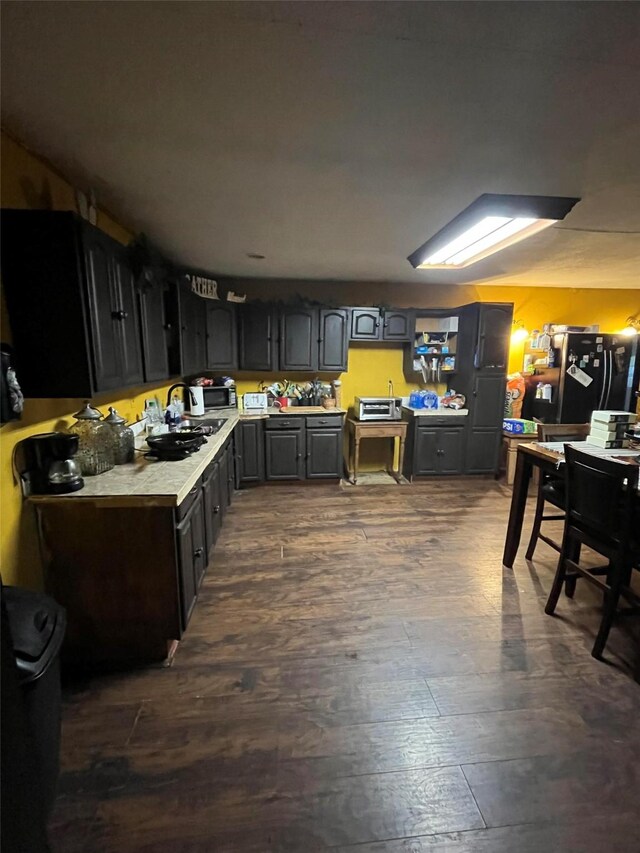 kitchen featuring dark wood-type flooring