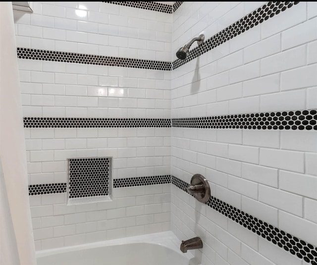 bathroom featuring shower / tub combo with curtain