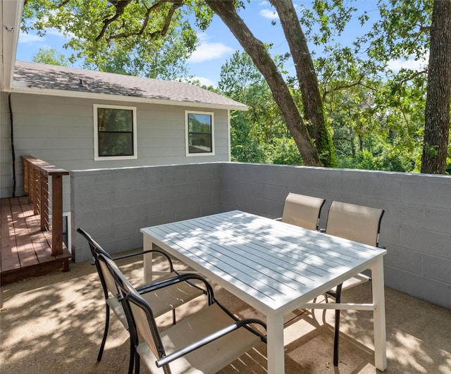 view of patio with a wooden deck