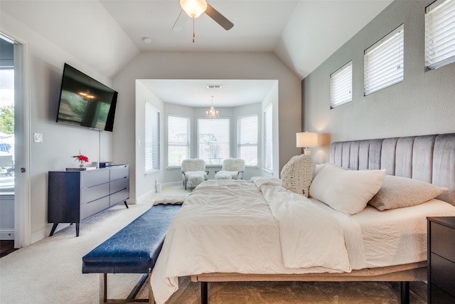 bedroom featuring access to outside, vaulted ceiling, light colored carpet, and ceiling fan with notable chandelier