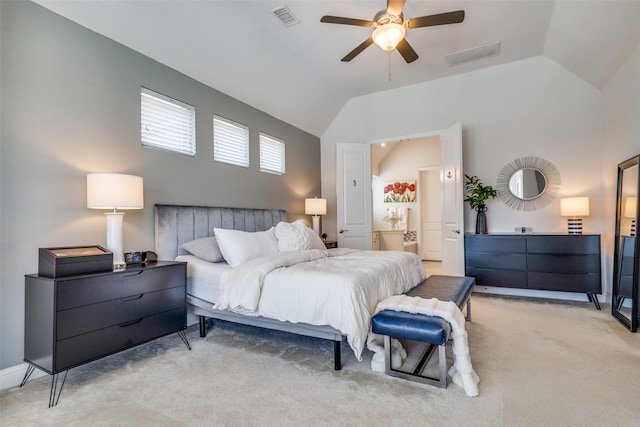 carpeted bedroom with lofted ceiling and ceiling fan