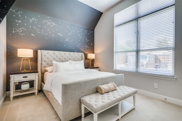 bedroom featuring carpet flooring and lofted ceiling