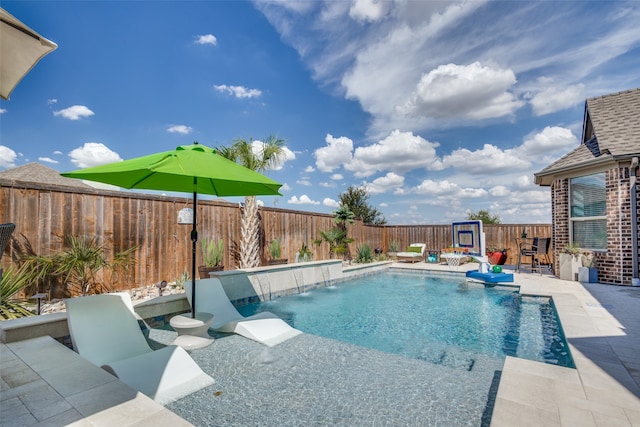 view of swimming pool featuring a patio and pool water feature