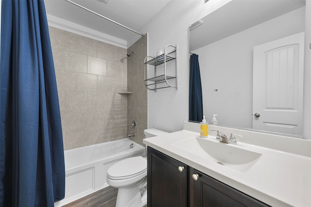 full bathroom with toilet, shower / tub combo with curtain, vanity, and hardwood / wood-style flooring