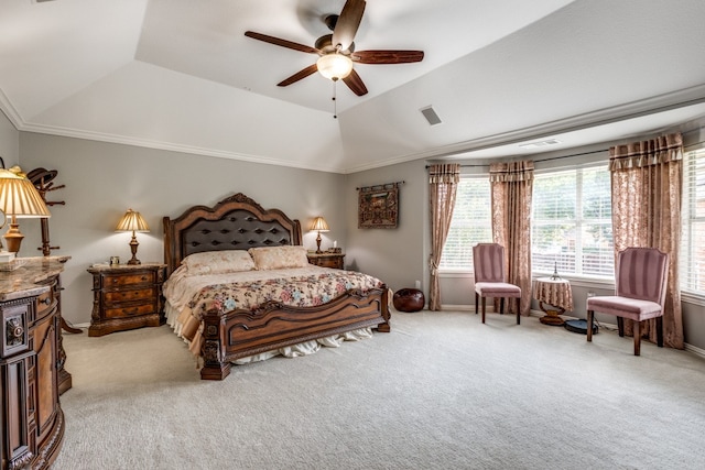 bedroom with carpet flooring, a raised ceiling, ceiling fan, crown molding, and lofted ceiling