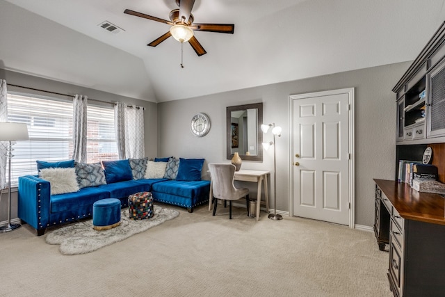 living room featuring light carpet, ceiling fan, and lofted ceiling