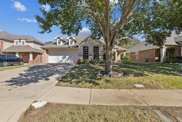 view of front facade with a front lawn and a garage