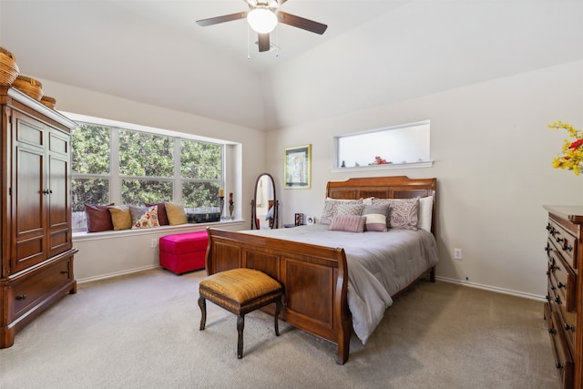 bedroom featuring ceiling fan, high vaulted ceiling, and light colored carpet