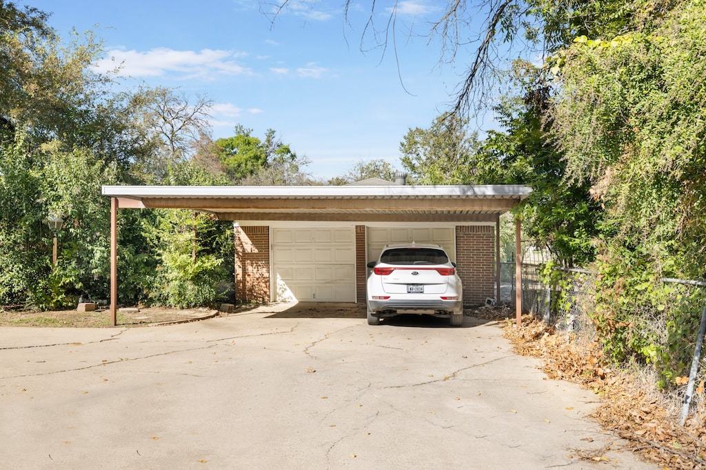 garage with a carport