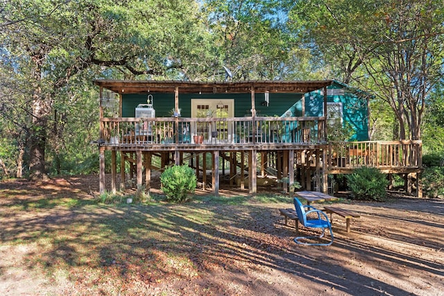 view of front of property featuring a deck