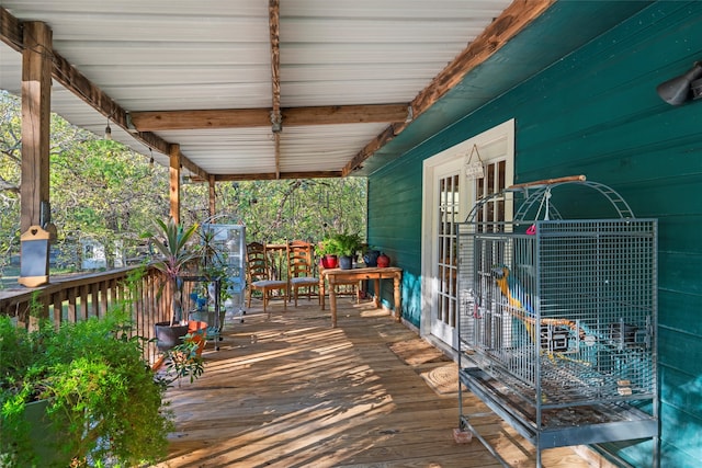 wooden terrace featuring french doors