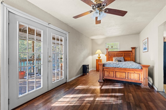 bedroom with french doors, a textured ceiling, dark hardwood / wood-style floors, access to exterior, and ceiling fan