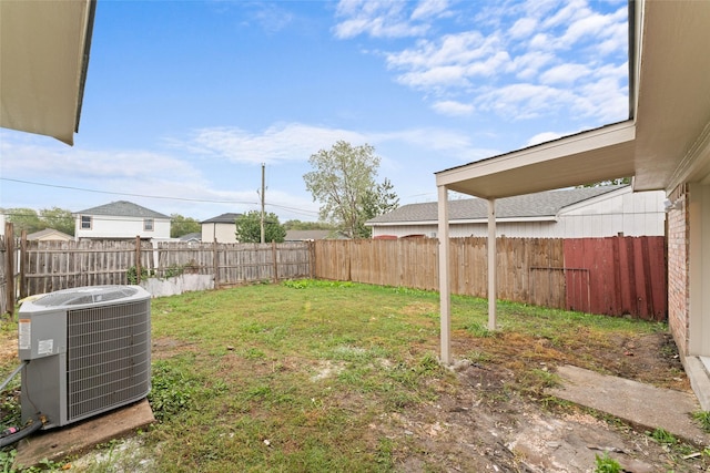 view of yard featuring central AC