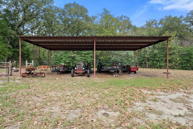 view of yard with a carport