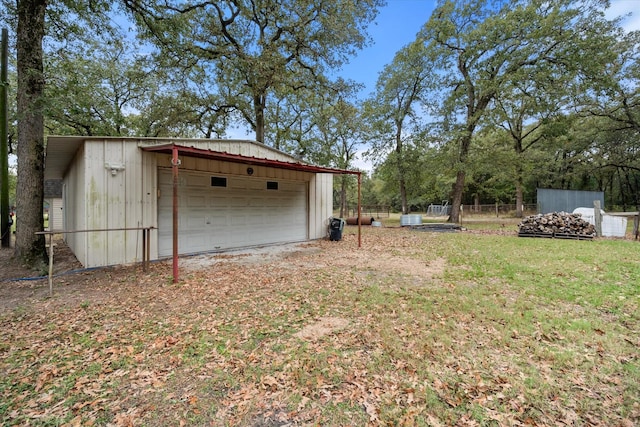 garage with a yard