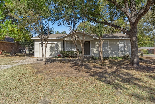 ranch-style home with a front lawn