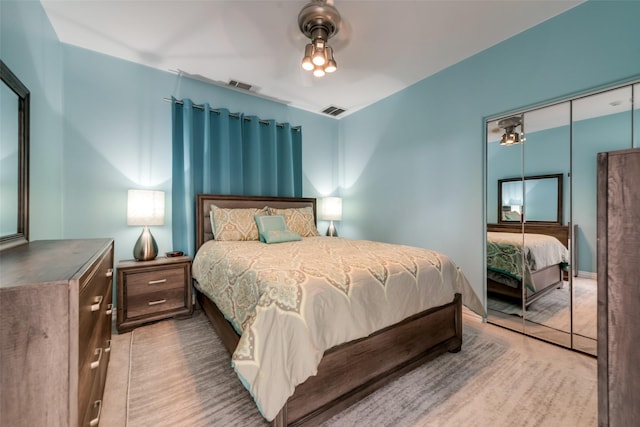 bedroom featuring a closet and a ceiling fan