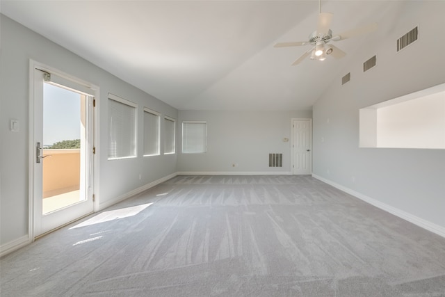 unfurnished living room featuring high vaulted ceiling, light carpet, and ceiling fan