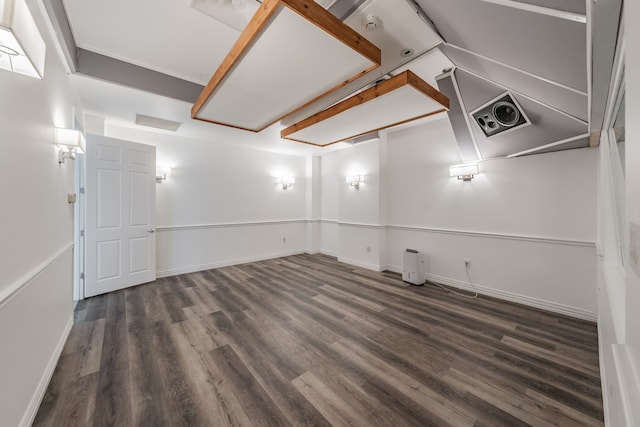 empty room with dark wood-type flooring