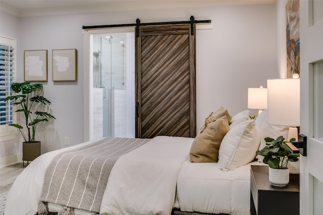 bedroom featuring a barn door