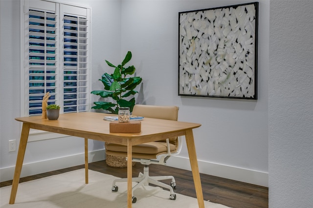 office with hardwood / wood-style flooring