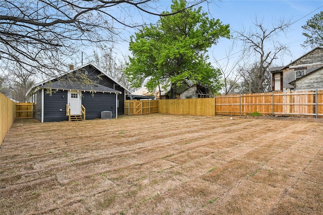 view of yard featuring central AC unit