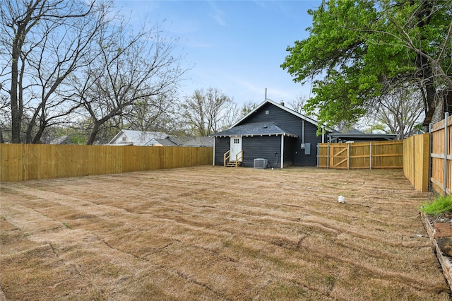 view of yard featuring central AC unit