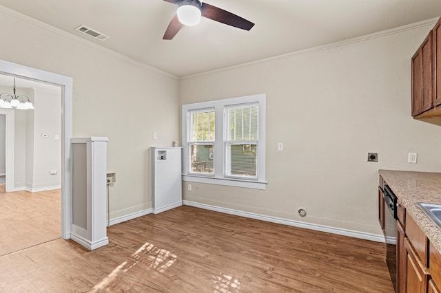 interior space with dishwasher, wood-type flooring, ornamental molding, and ceiling fan with notable chandelier