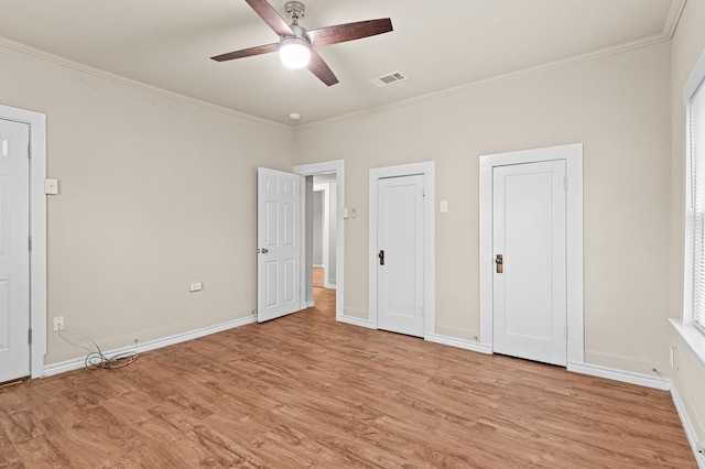 unfurnished bedroom with ornamental molding, ceiling fan, and light hardwood / wood-style floors