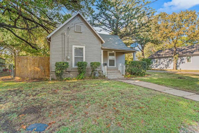 view of front of home with a front lawn