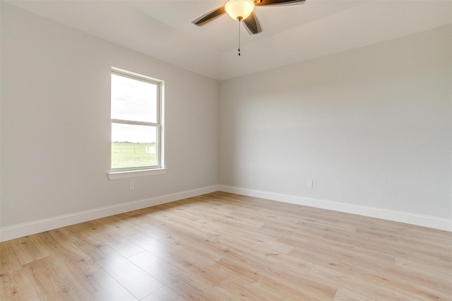 unfurnished room featuring ceiling fan and light wood-type flooring