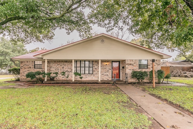 ranch-style house with a front lawn