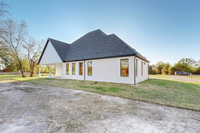 view of property exterior featuring a yard