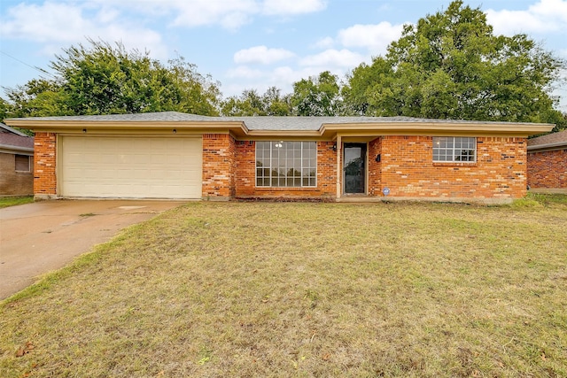 single story home with a garage and a front lawn