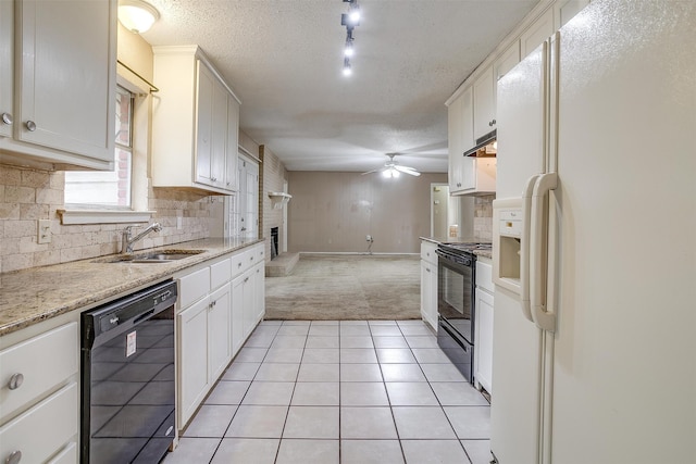 kitchen featuring black appliances, white cabinetry, a textured ceiling, and light tile patterned floors