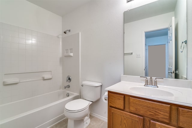 full bathroom with tile patterned flooring, tiled shower / bath, toilet, and vanity