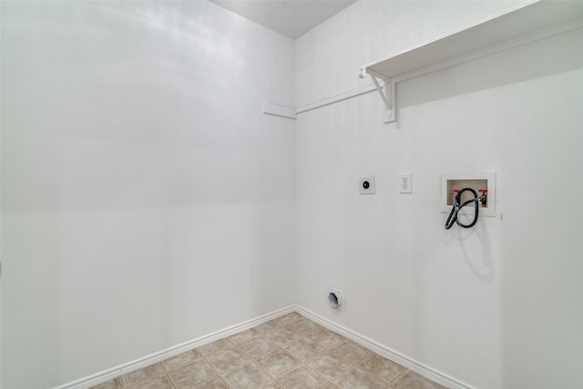 clothes washing area featuring hookup for an electric dryer and washer hookup