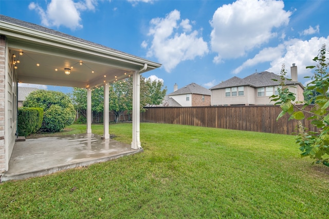 view of yard featuring a patio area