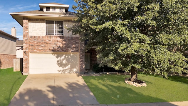 view of front of home with a garage and a front yard