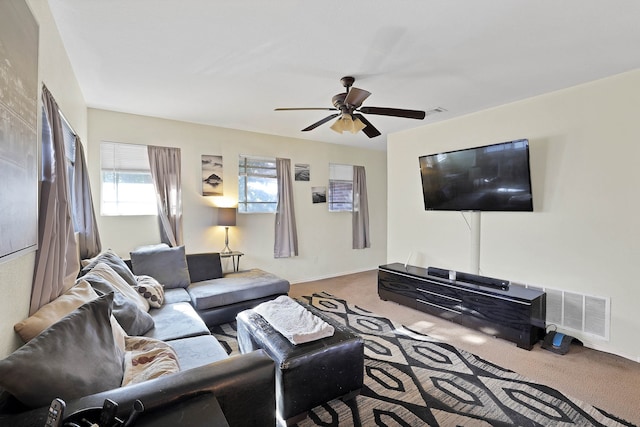 living room featuring ceiling fan and carpet flooring