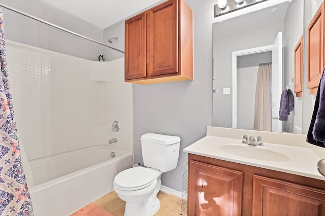 bathroom with vanity, tile patterned floors, and toilet