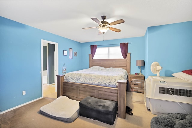 bedroom with ceiling fan and light colored carpet